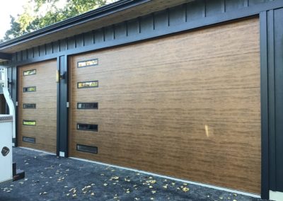 Clopay vertical windowed wooden garage door installation in Wheatland, Wisconsin
