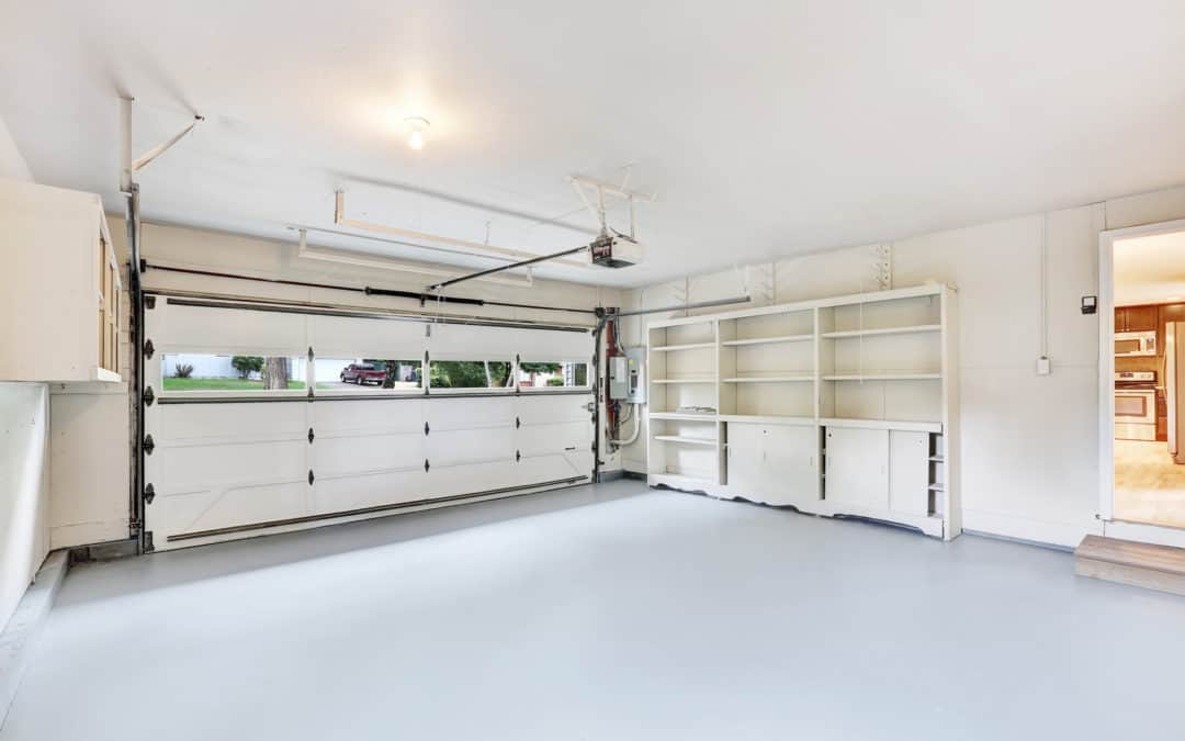 garage with an interior door and windows