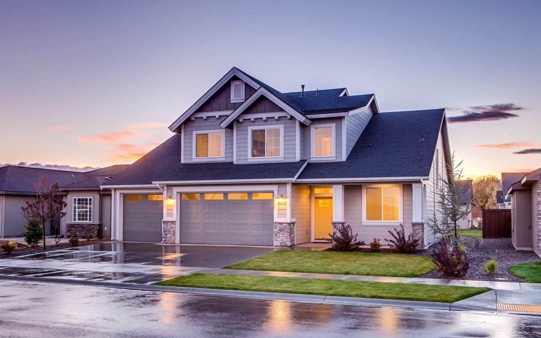 Two Story Home at Sunset on a Rainy Day