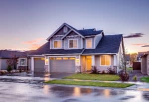 Two Story Home at Sunset on a Rainy Day