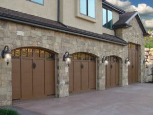 Exterior shot of wood panel garage doors.