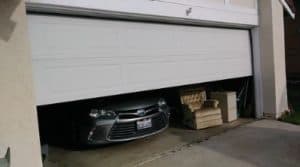 Slow opening garage door repair.